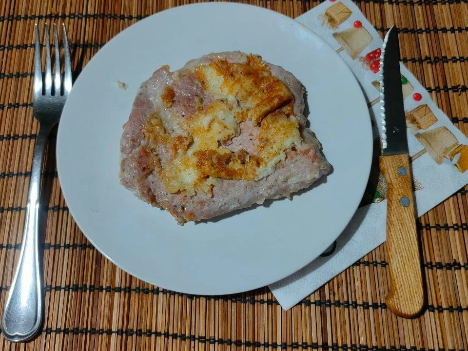 Свиные отбивные в яйце