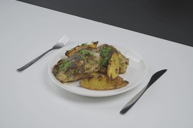 Запеченные куриные бедра с апельсинами