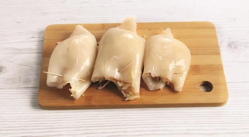 Кальмары, фаршированные рисом в духовке: шаг 7